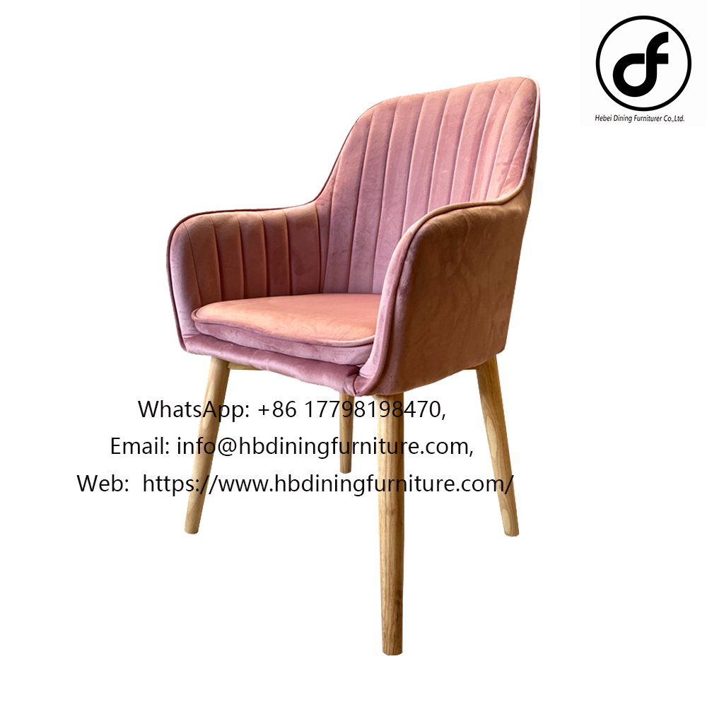 Pink velvet upholstered armchair